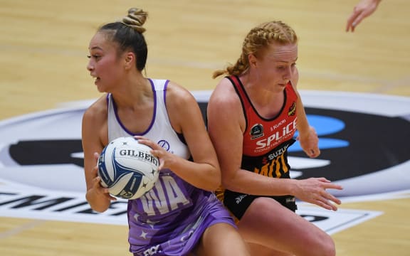 Mila Reuelu-Buchanan of the Northern Stars and and Samantha Sinclair of the WBOP Magic in action in Tauranga.