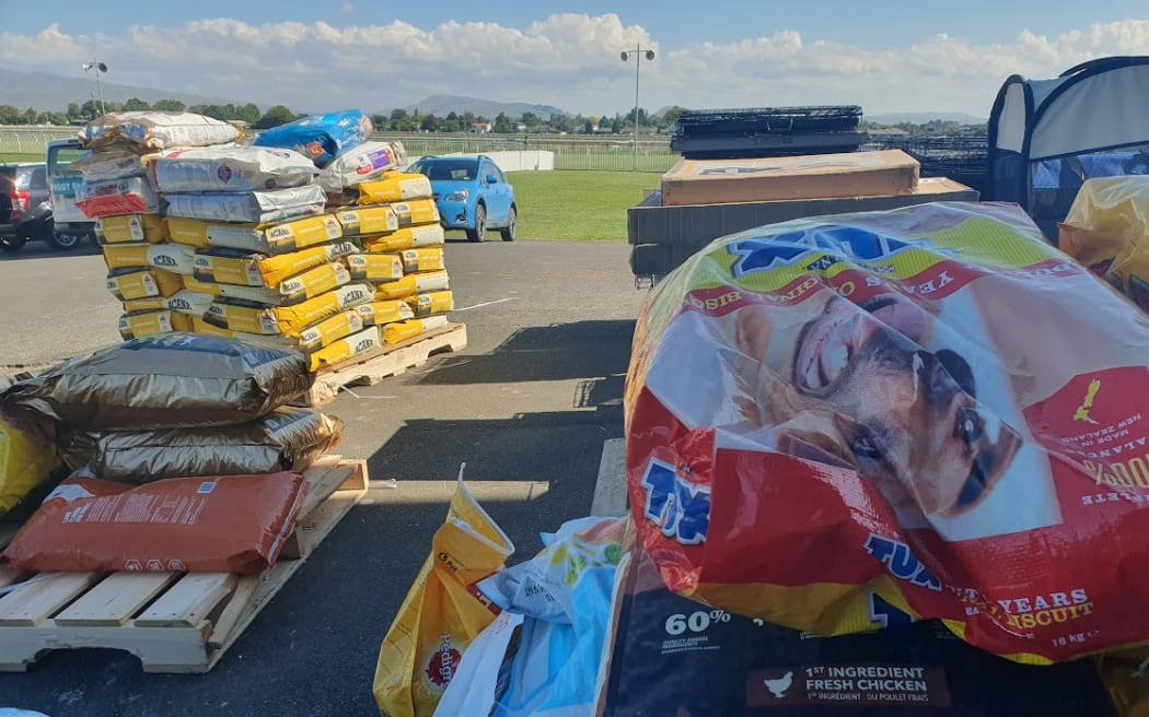 Pallets of donated dog food arrive at Huha's headquarters in the wake of Cyclone Gabrielle