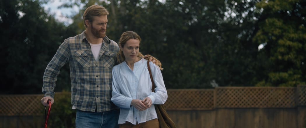 (from left) Ray Waller (Wyatt Russell) and Eve Waller (Kerry Condon) in Night Swim, directed by Bryce McGuire.