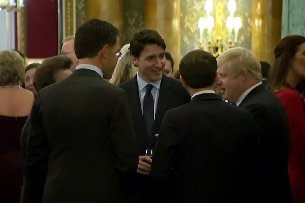 Dutch Prime Minister Mark Rutte (L), French President Emmanuel Macron (front), British Prime Minister Boris Johnson (R) and Canada's Prime Minister Justin Trudeau (back centre) were heard making remarks  at a Buckingham Palace reception, reportedly about Donald Trump.
