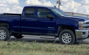 This handout images obtained courtesy of Ernst Villanueva taken on August 31, 2019 show a car with multiple bullet holes on the windows after a gunman open fire in the I-20 highway in between Odessa and Midland, Texas.