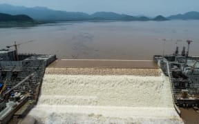 This handout picture taken on July 20, 2020, and released by Adwa Pictures on July 27, 2020, shows an aerial view Grand Ethiopian Renaissance Dam on the Blue Nile River in Guba, northwest Ethiopia.