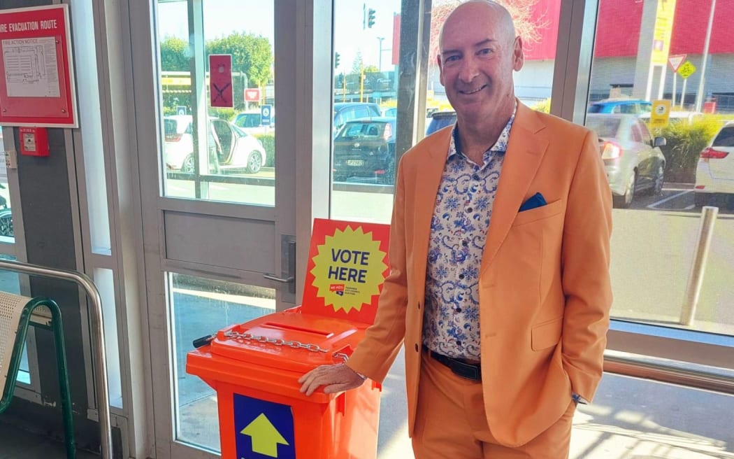 Tauranga electoral officer Warwick Lampp at one of the 40 orange voting bins available in Tauranga