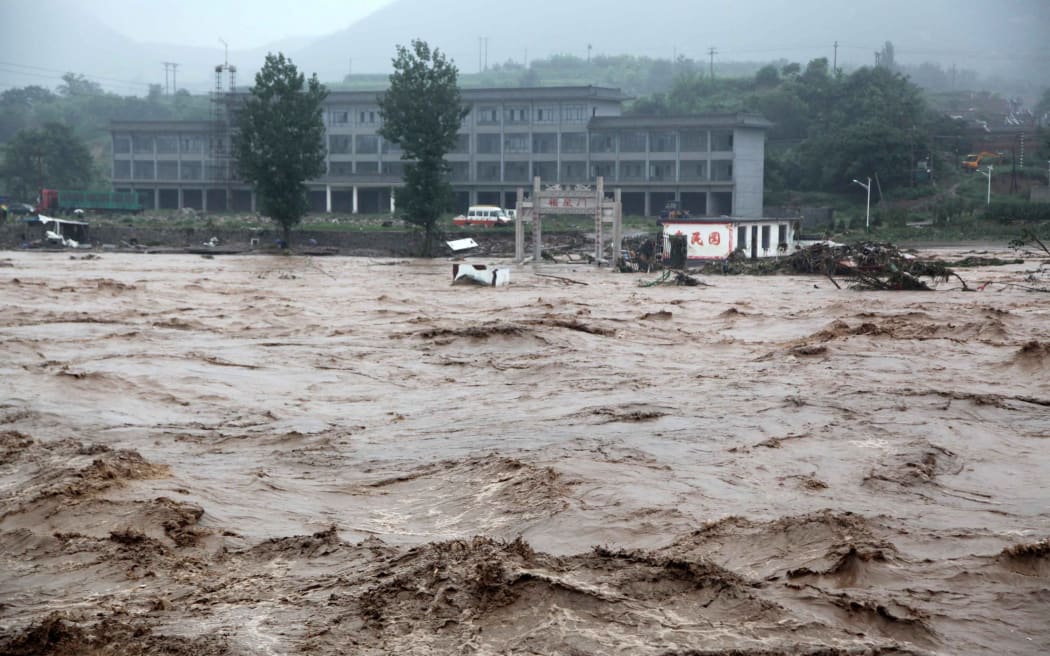 Floods in Jingxing County of Shijiazhuang City, north China's Hebei Province on Wednesday.