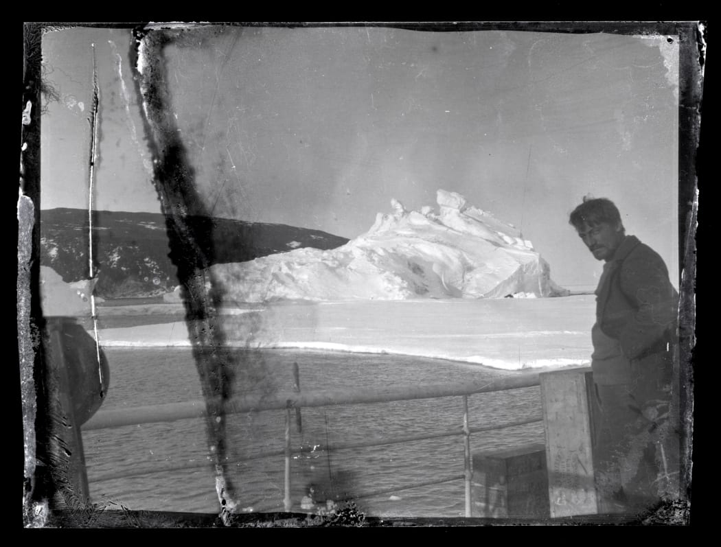 Alexander Stevens on the deck of the Aurora at McMurdo Sound in Antarctica.