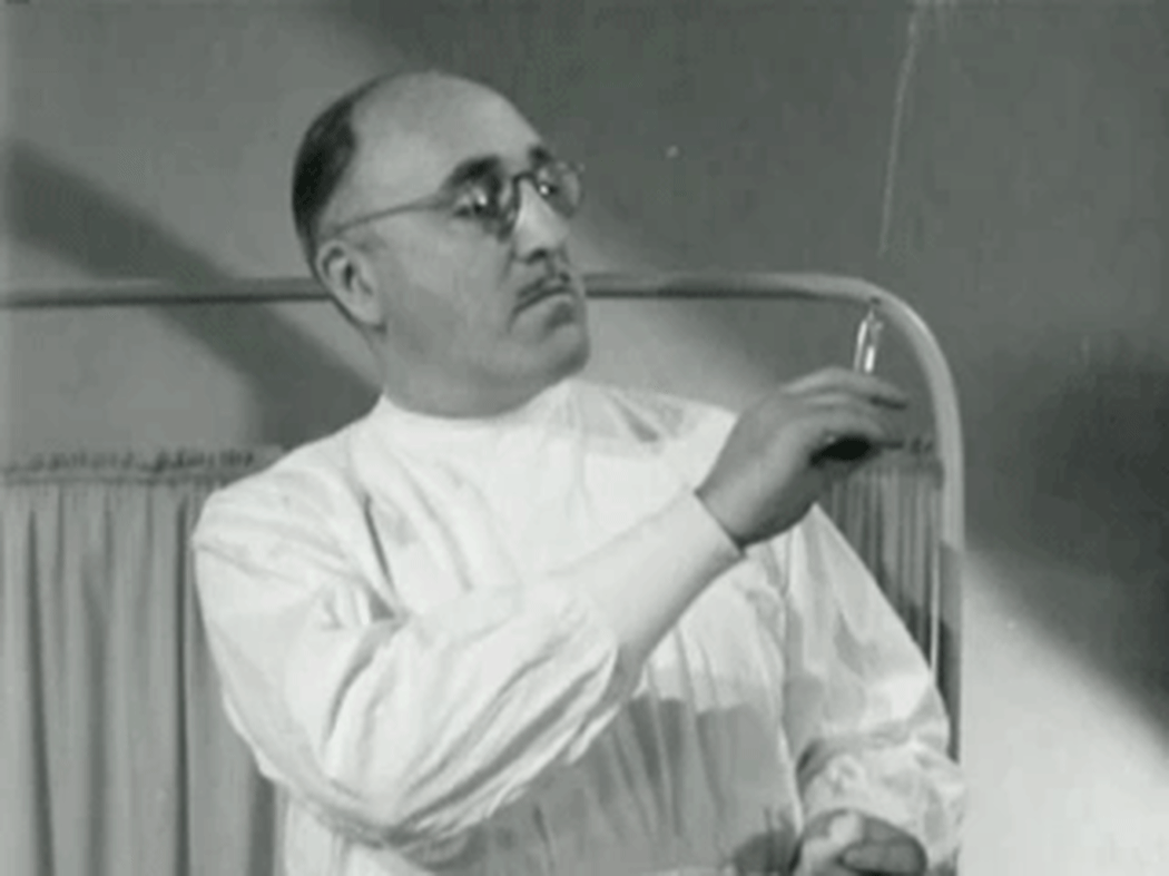 an old fashioned doctor, from a black and white movie, shooting a syringe