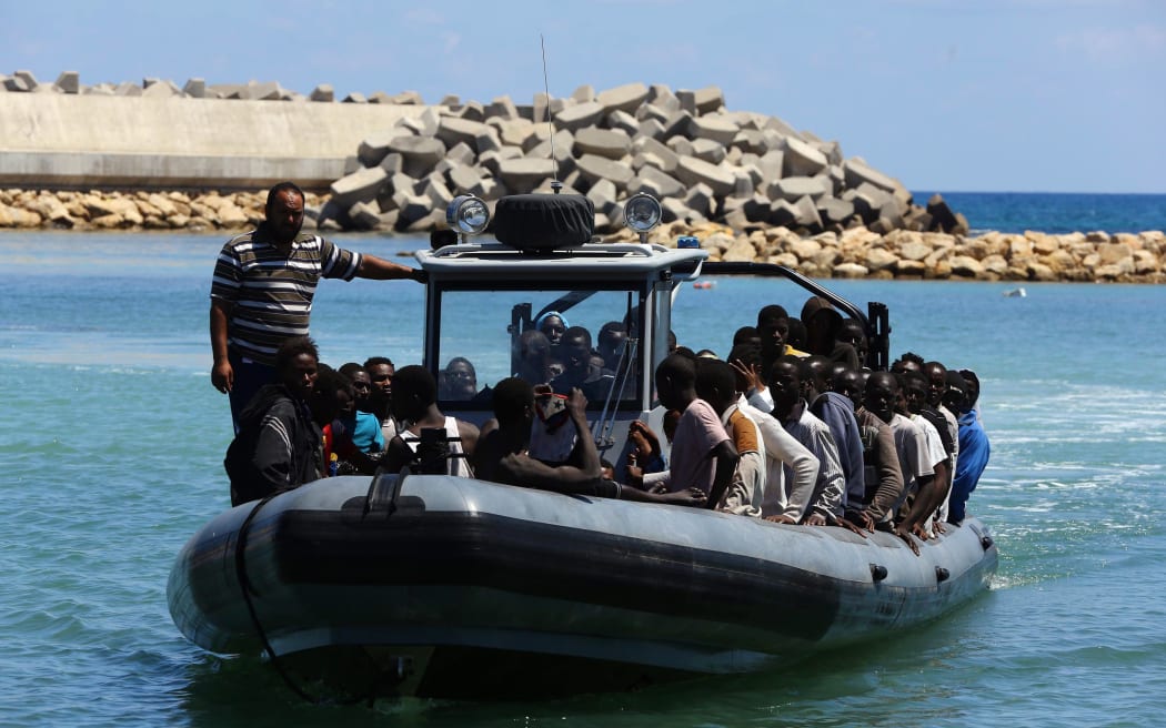 The Libyan coastguard escorting illegal migrant after their boat started to sink in July last year.