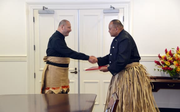 King Tupou VI receives Tonga's new Prime Minister Siaosi Sovaleni, after presenting the Royal Warrant of Appointment for the PM at the Royal Palace in Nuku'alofa on Tuesday 28 December 2021. Sovaleni was elected as PM by the new parliament, following Tonga's November 18 general election.