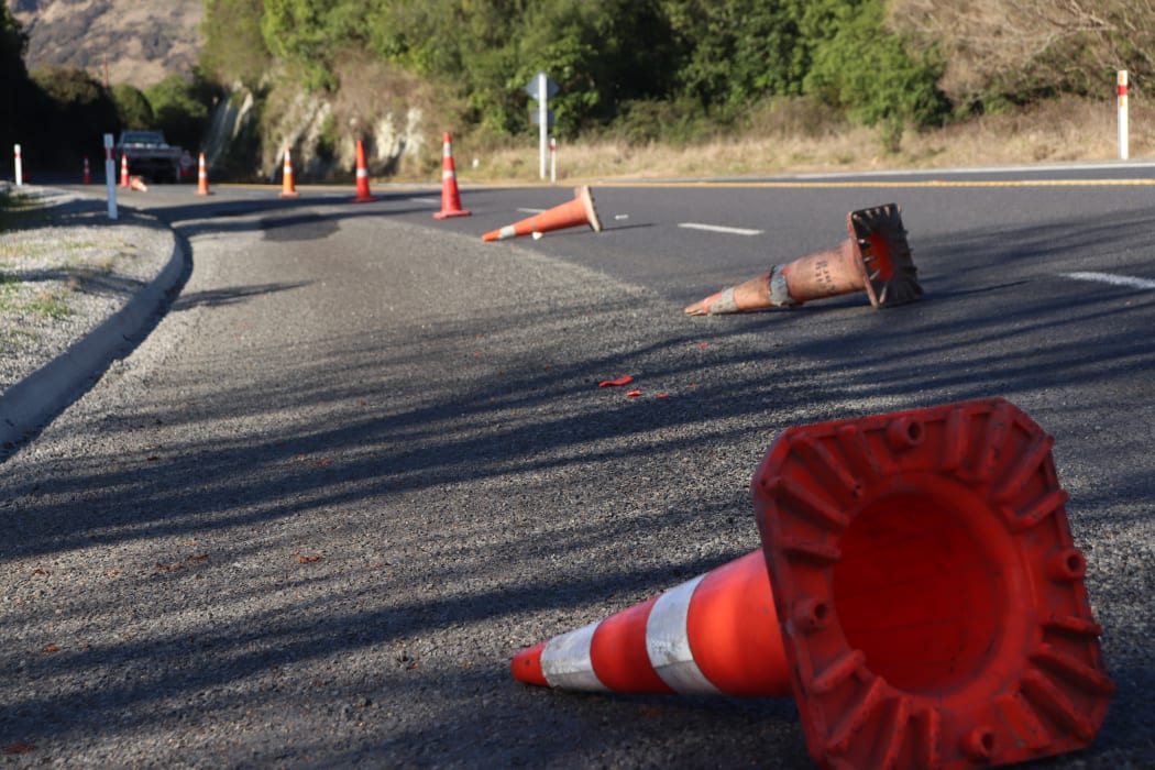 Cones left lying on the road - locals have seen them lying here for a long time