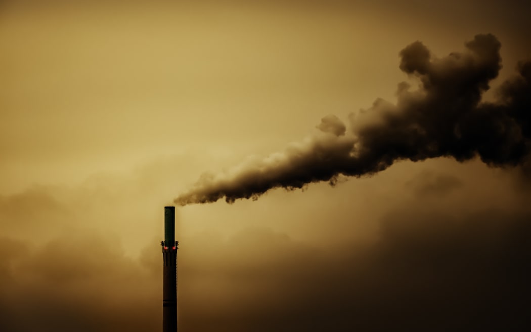 Industrial air pollution smoke chimney.