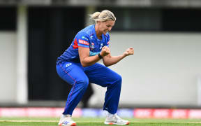 Auckland Hearts Molly Penfold celebrates a wicket.