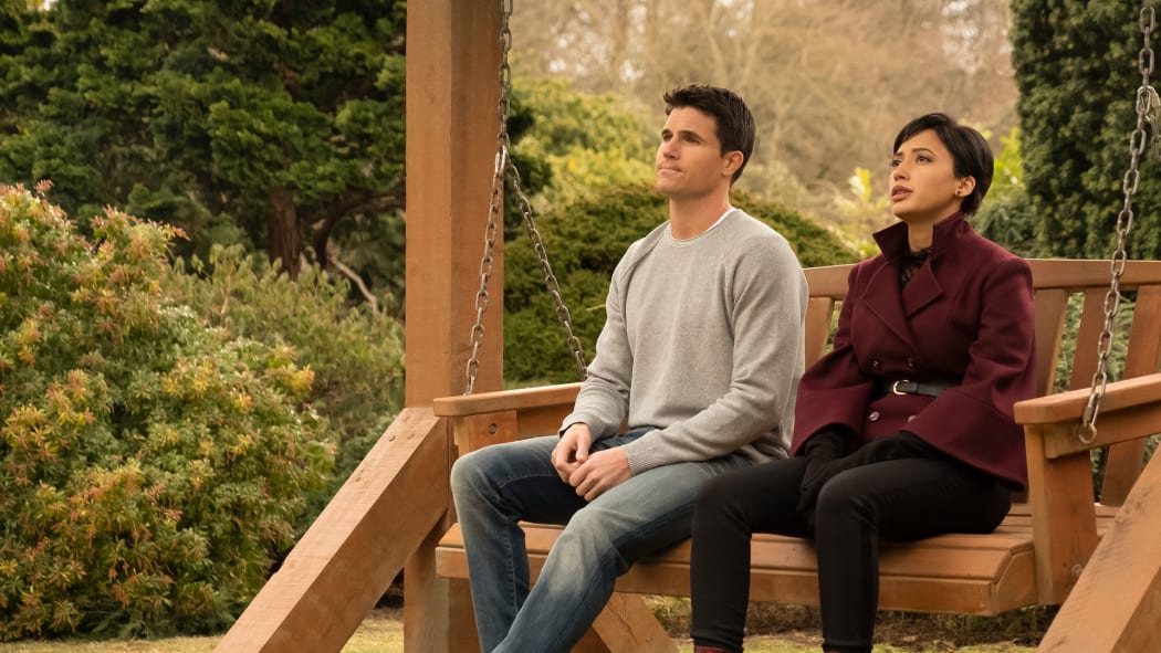 Still from season one of Upload featuring Robbie Arnell (Nathan) and Andy Allo (Nora)
