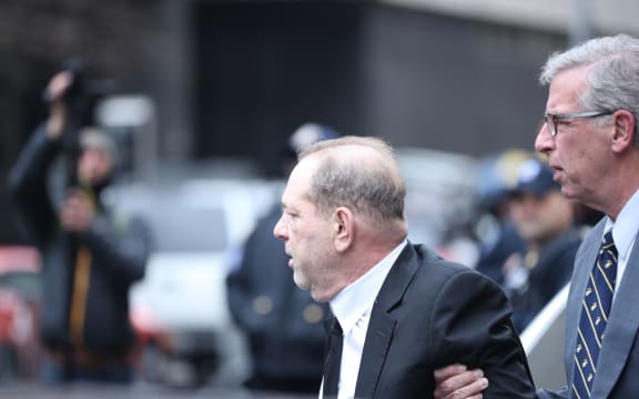 Harvey Weinstein leaves the New York Supreme Court  after the first day of his trial on charges of sexual assault.
