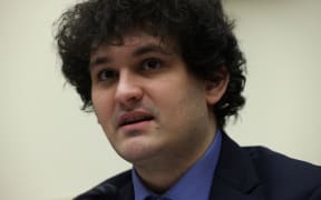 (FILES) FTX's former CEO and founder Sam Bankman-Fried testifies during a hearing before the House Financial Services Committee at Rayburn House Office Building on Capitol Hill December 8, 2021 in Washington, DC. Disgraced cryptocurrency wunderkind Bankman-Fried was sentenced to 25 years in jail on March 28, 2024, following his conviction in one of the biggest financial fraud cases in history. (Photo by ALEX WONG / GETTY IMAGES NORTH AMERICA / AFP)