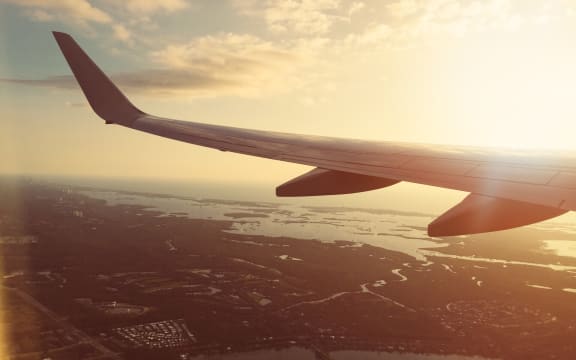 plane wing at sunset