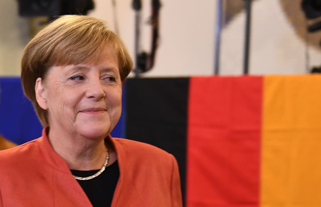 German chancellor Angela Merkel's have beaten their rivals to win her a fourth term.