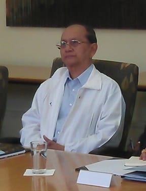 Thein Sein listening to a presentation at the University of Auckland.