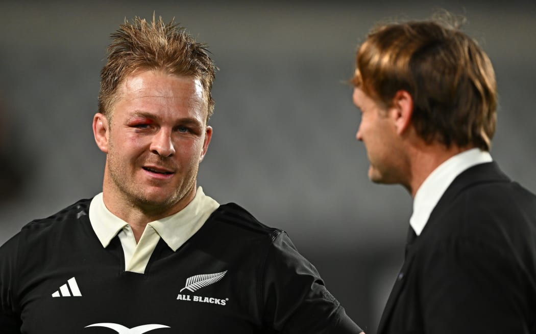 New Zealand’s Sam Cane and head coach Scott Robertson.
