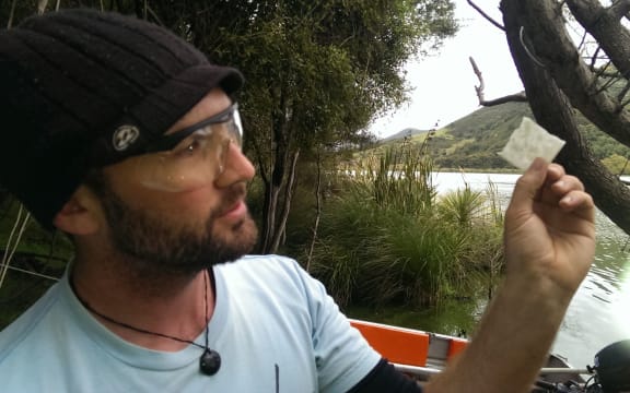 Jonathan Puddick from the Cawthron Institute inspects frozen bacterial colonies.