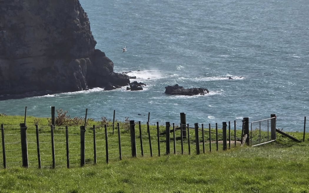 Three people were rescued from a yacht capsize off Banks Peninsula