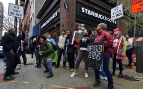 Protesters gather on April 16, 2018 for a protest at the Starbucks location in Center City Philadelphia.