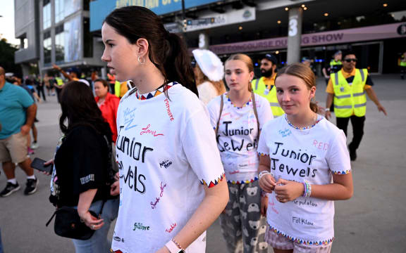 Security move ticketless fans of Taylor Swift away from the Melbourne Cricket Ground before the first of Swift's three shows in Melbourne on 16 February, 2024. (Photo by William WEST / AFP)