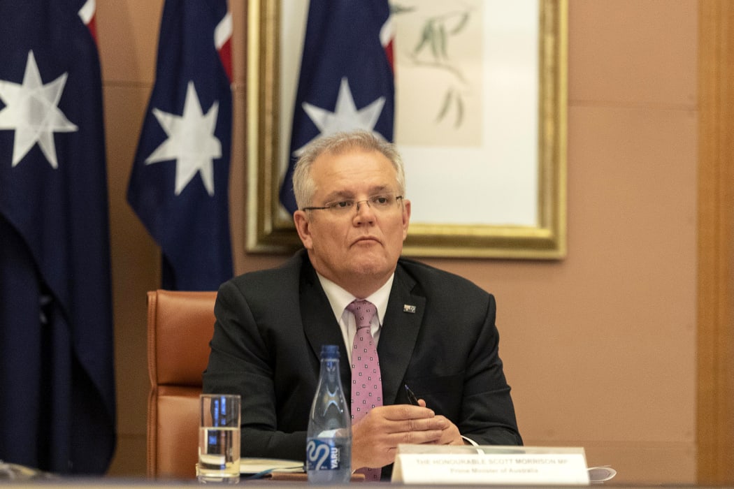 Australian Prime Minister Scott Morrison attends a video conference with G20 leaders to discuss the COVID-19 coronavirus, at the Parliament House in Canberra on March 26, 2020.