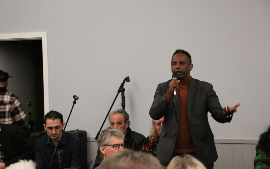 Labour candidate Ibrahim Omer speaks to the audience at the Aro Valley general elections debate on 1 September, 2023.
