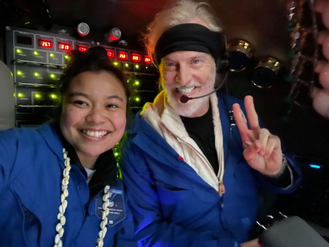 Inside the submersible Limiting Factor close to the ocean floor, Nicole Yamase and pilot/owner Victor Vescovo