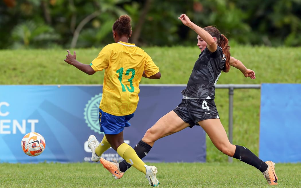 New Zealand's Mackenzie Barry and Solomon Islands Jacklyn Ikama, Women's Olympic Football Tournament, Oceania Qualifier Final, Solomon Islands v New Zealand, FFS Football Stadium Apia, Samoa, Monday 19 February 2024. Photo: Shane Wenzlick / www.phototek.nz