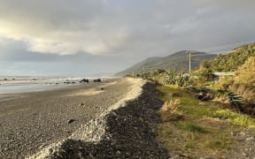 Protection of the Granity-Ngakawau foreshore in northern Buller remains up in the air in lieu of no funding for permanent sea protection or a rating district, with residents relying on a temporary bund (pictured), after several recent ocean surges.