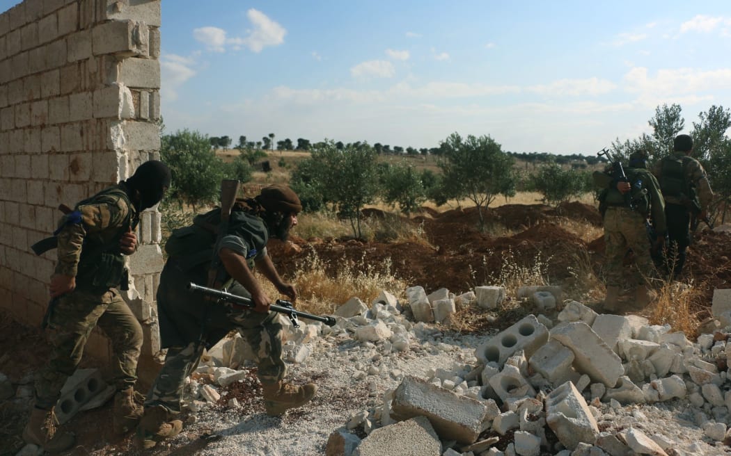 Syrian opponents clash with Assad regime forces in the Khan Tuman town of Aleppo, Syria on May 5, 2016 after the Assad regime forces violated the ceasefire.