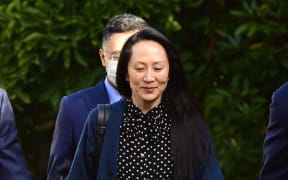 Huawei Chief Financial officer Meng Wanzhou leaves her Vancouver home to attend her extradition hearing, 24 September 2021, in Vancouver, Canada.