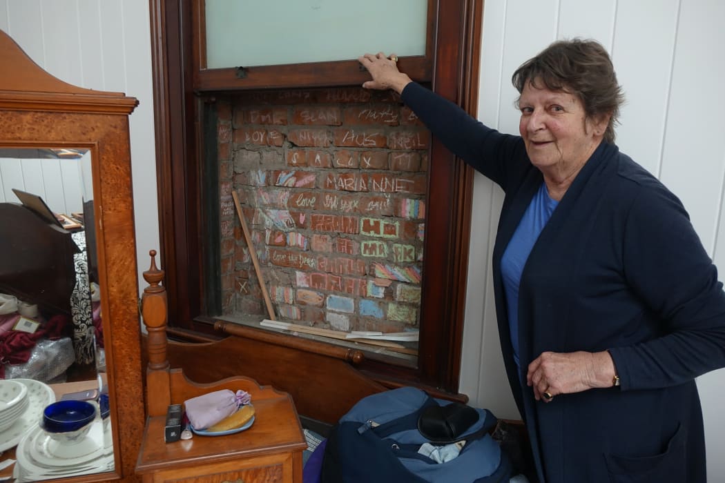 "The various students who've lived here have all left their names and various messages in chalk on the wall," said Kerry Girdwood.
