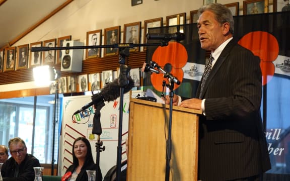 Winston Peters speaking to a crowd of people at Kaikohe RSA.