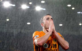 Diogo Jota reacts after missing a chance when playing for Wolves.