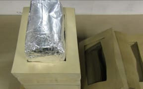Drugs concealed and declared as paper packaging.