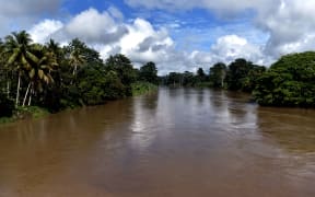 A photo taken on September 3, 2014 shows a view of the river near the town of Malalaua in the jungle of Papua New Guinea.