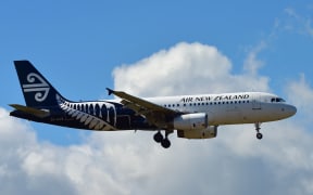 Air New Zealand Airbus A320 landing at Auckland International Airport.