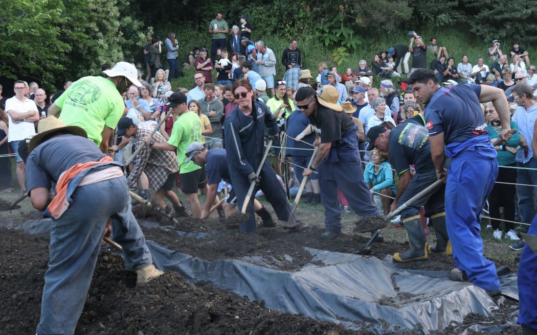 The giant post-race hāngī is as much a highlight of the event as the race itself.