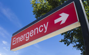 Sign outside the emergency room of a hospital