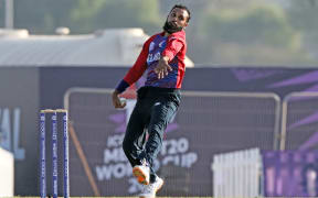 Adil Rashid of England bowls.
