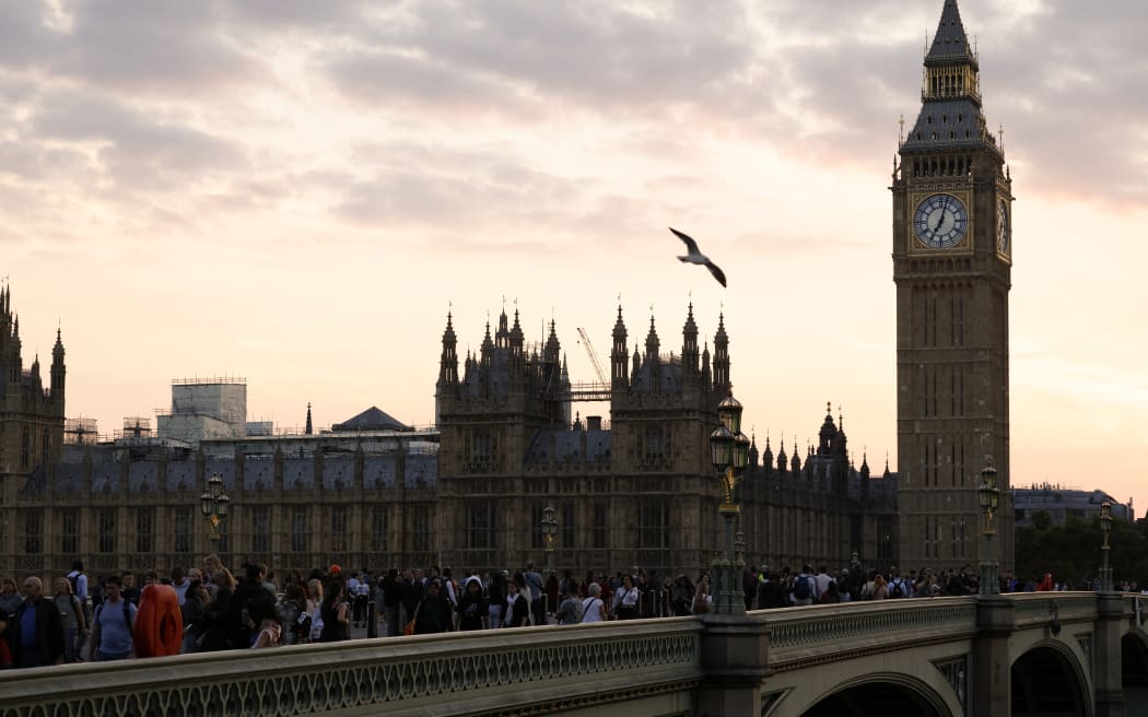 Members of the public join the queue on Westminster Bridge, as they wait in line to pay their respects to the late Queen Elizabeth II, Lying-in-State in the Palace of Westminster in London on 14 September, 2022.
