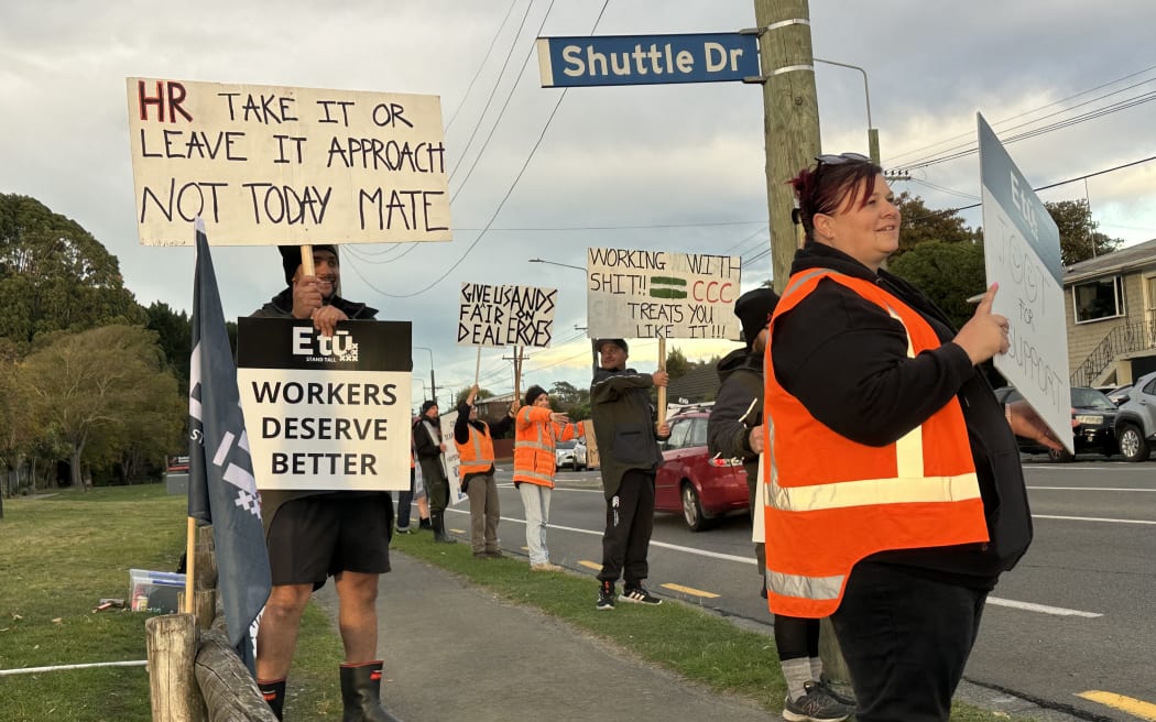 Workers picket the Christchurch wastewater plant.