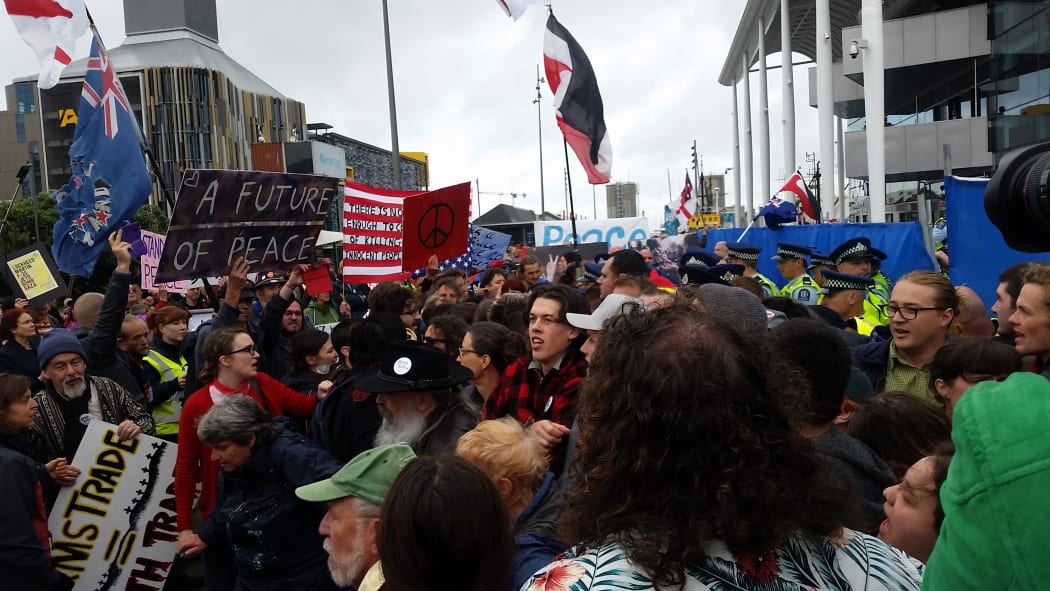 Protesters at the annual defence forum