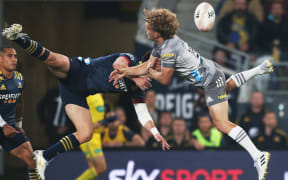 Connor Garden-Bachop (left) and Damian McKenzie compete for a high ball