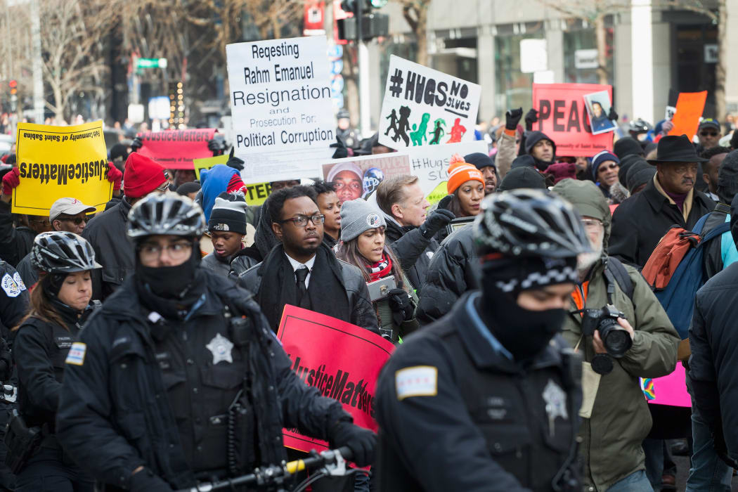 People in Chicago protest the fatal police shooting of teenager Laquan McDonald in 2015.