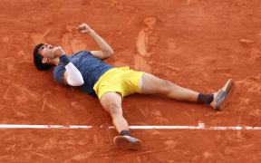 Spain's Carlos Alcaraz celebrates after winning the French Open men's singles final against Germany's Alexander Zverev.