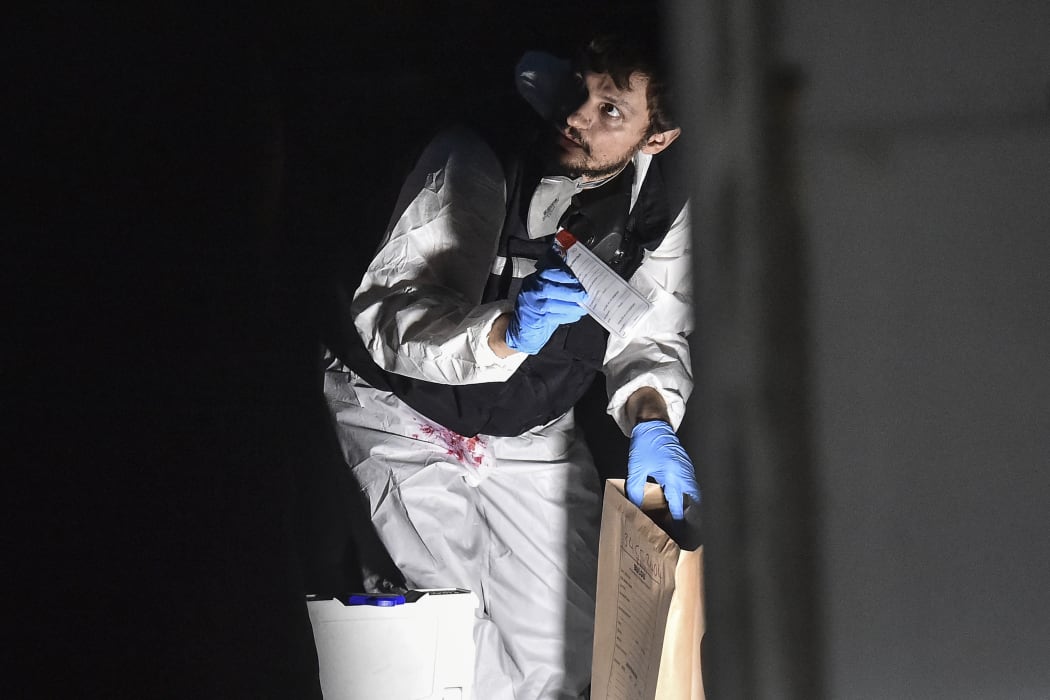 A Turkish forensic police officer searches for evidence at the Saudi Arabian consulate on October 17, 2018 in Istanbul.