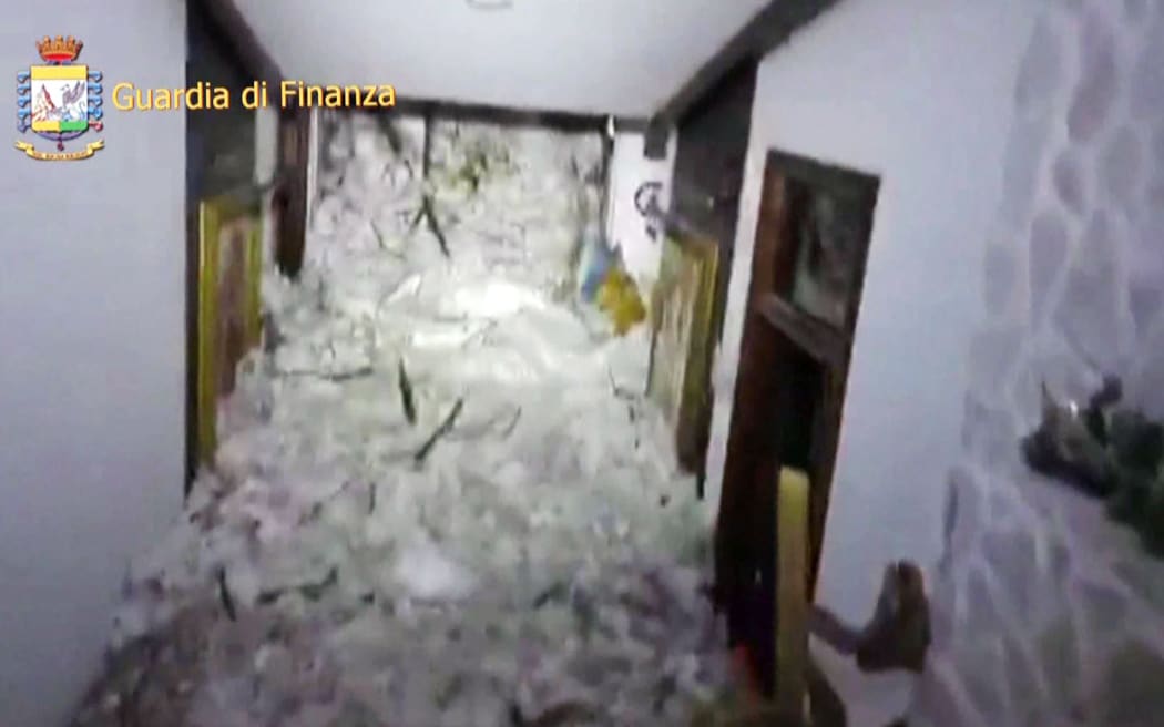 A wall of snow inside the Hotel Rigopiano, shown on a screen grab from a police video.
